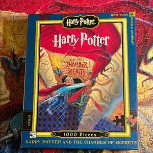 🧩 1000 piece N Y Puzzle Co.  “Harry Potter and the Chamber of Secrets”. Complete